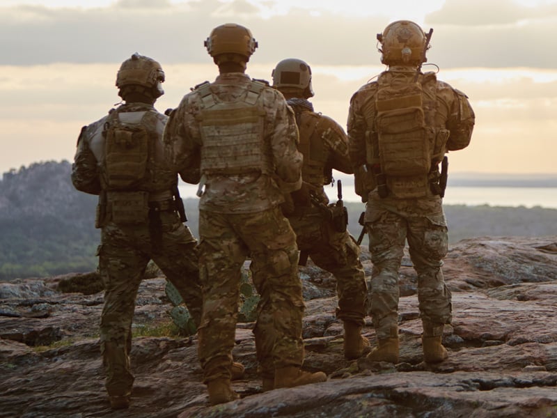 ridge with soldiers wearing coyote brown rocky military boots